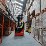 PalStore-Warehouse-Picking A worker using equipment for safe warehouse picking